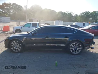 2014 Audi A7 Premium Plus z VIN WAUWGAFC4EN092525, wystawiony jako IAAI lot #42331183 z przebiegiem 183 258 mil mil oraz . Historia ofert i sprzedaży dostępna na DreamBid. Obrazek 14.