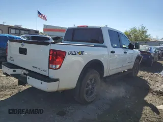 2015 Nissan Titan SL with VIN 1N6BA0ECXFN503956, listed as a Copart auction lot 80520844 with 107,989 mi miles and Salvage Title. Bid and sale history available at carsss.com. Image 3.