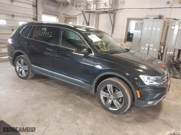 2020 Volkswagen Tiguan SE with VIN 3VV2B7AX4LM115131, listed as a IAAI auction lot 42017352 with 87,909 mi miles. Bid and sale history available at carsss.com. Image 1.