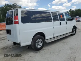 2017 Chevrolet Express Passenger LT with VIN 1GAZGPFG2H1180404, listed as a Copart auction lot 56962715 with 89,706 mi miles and Salvage title. Bid and sale history available at DreamBid. Image 3.