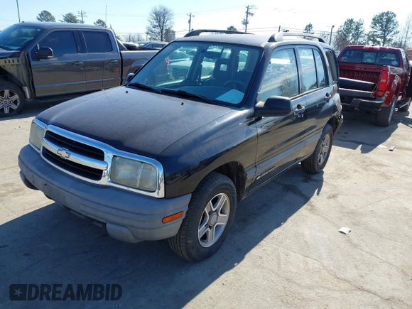 2003 Chevrolet Tracker with VIN 2CNBE13C736921273, listed as a IAAI auction lot 41453815 with 150,768 mi miles and . Bid and sale history available at DreamBid. Image 2.