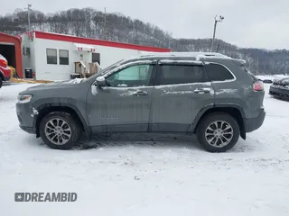 2019 Jeep Cherokee Latitude Plus with VIN 1C4PJMLB9KD399289, listed as a IAAI auction lot 41314743 with 84,726 mi miles. Bid and sale history available at carsss.com. Image 14.