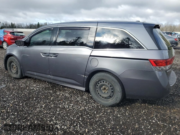 2014 Honda Odyssey Touring z VIN 5FNRL5H98EB512144, wystawiony jako Copart lot #69987533 z przebiegiem 184 231 mil mil oraz Szkoda całkowita • Salvage title. Historia ofert i sprzedaży dostępna na DreamBid. Obrazek 2.