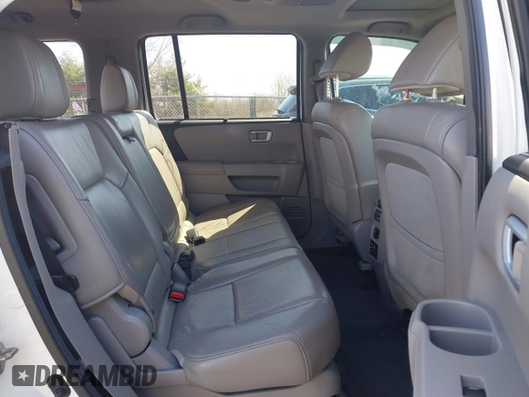 2013 Honda Pilot Touring with VIN 5FNYF3H9XDB006353, listed as a IAAI auction lot 41826557 with 174,552 mi miles and . Bid and sale history available at DreamBid. Image 8.