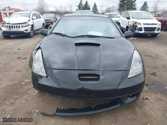 2000 Toyota Celica GT with VIN JTDDR32T7Y0006809, listed as a IAAI auction lot 41860933 with 262,014 mi miles. Bid and sale history available at carsss.com. Image 12.