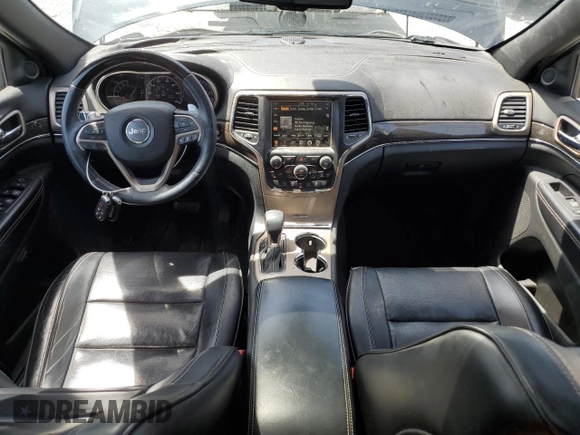 2016 Jeep Grand Cherokee Overland with VIN 1C4RJFCG9GC338165, listed as a Copart auction lot 54125815 with 102,302 mi miles and Salvage title. Bid and sale history available at DreamBid. Image 8.
