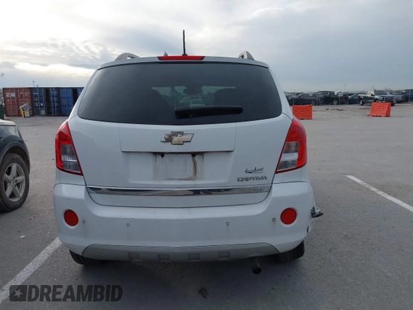 2014 Chevrolet Captiva Sport LTZ z VIN 3GNAL4EK6ES631467, wystawiony jako IAAI lot #40948171 z przebiegiem 146 395 mil mil oraz . Historia ofert i sprzedaży dostępna na DreamBid. Obrazek 17.