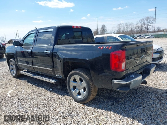 2018 Chevrolet Silverado 1500 LTZ with VIN 3GCUKSEC9JG469059, listed as a IAAI auction lot 41903377 with 140,245 mi miles. Bid and sale history available at carsss.com. Image 3.