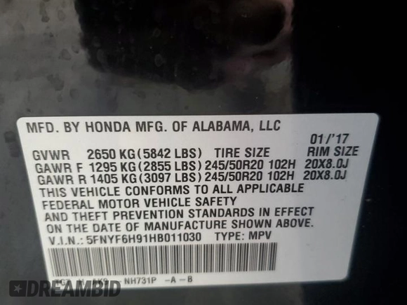 2017 Honda Pilot Touring z VIN 5FNYF6H91HB011030, wystawiony jako Copart lot #60236875 z przebiegiem 119 909 mil mil oraz Szkoda całkowita • Salvage title. Historia ofert i sprzedaży dostępna na DreamBid. Obrazek 13.