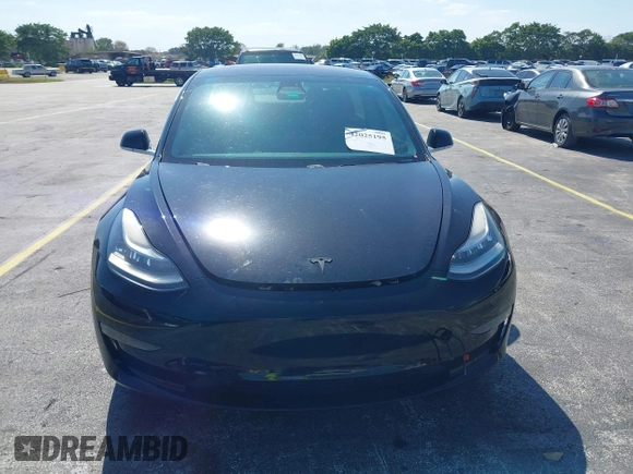 2019 Tesla Model 3 Mid Range with VIN 5YJ3E1EA0KF317058, listed as a IAAI auction lot 42025195 with 108,771 mi miles. Bid and sale history available at carsss.com. Image 6.