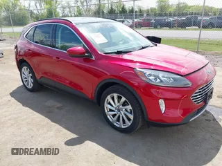 2021 Ford Escape Titanium Hybrid with VIN 1FMCU9DZ9MUA15184, listed as a IAAI auction lot 42093809 with 48,983 mi miles and . Bid and sale history available at DreamBid. Image 1.