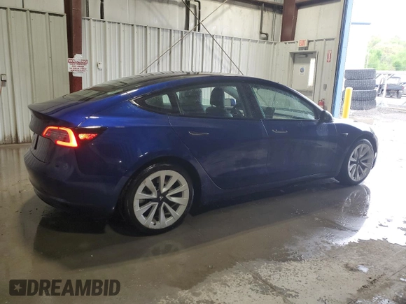 2022 Tesla Model 3 with VIN 5YJ3E1EA7NF369551, listed as a Copart auction lot 55610805 with 128,311 mi miles and Clean Title. Bid and sale history available at DreamBid. Image 3.