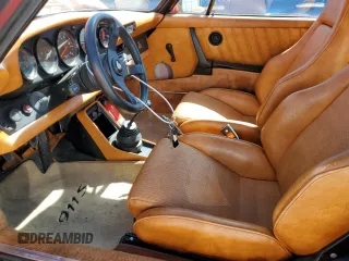 1977 Porsche 911 with VIN 9117200797, listed as a Copart auction lot 49103365 with 145,827 mi miles and Salvage title. Bid and sale history available at DreamBid. Image 7.