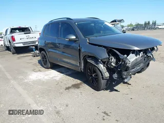 2016 Volkswagen Tiguan S z VIN WVGAV7AX1GW537635, wystawiony jako IAAI lot #42313707 z przebiegiem 94 230 mil mil oraz . Historia ofert i sprzedaży dostępna na DreamBid. Obrazek 1.