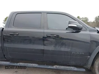 2019 Ram 1500 Rebel z VIN 1C6SRFLT1KN722064, wystawiony jako IAAI lot #41513201 z przebiegiem 113 559 mil mil oraz . Historia ofert i sprzedaży dostępna na DreamBid. Obrazek 14.
