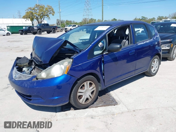 2009 Honda Fit with VIN JHMGE88249S056575, listed as a IAAI auction lot 41702555 with 116,658 mi miles. Bid and sale history available at carsss.com. Image 17.