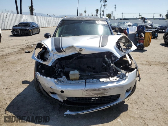 2012 MINI Countryman with VIN WMWZB3C58CWM02843, listed as a Copart auction lot 52131715 with Not Provided miles and Salvage Title. Bid and sale history available at DreamBid. Image 5.