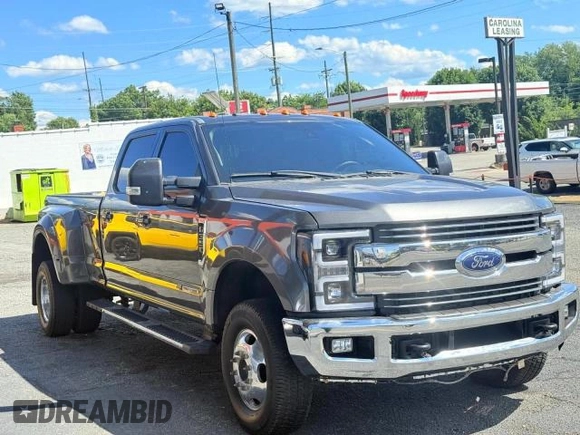 2017 Ford F-350 Lariat z VIN 1FT8W3DT9HEB28873, wystawiony jako Copart lot #58615765 z przebiegiem 100 307 mil mil oraz Szkoda całkowita • Salvage title. Historia ofert i sprzedaży dostępna na DreamBid. Obrazek 1.