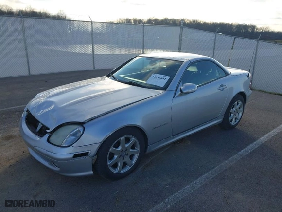 2001 Mercedes-Benz SLK-Class Kompressor with VIN WDBKK49F71F187400, listed as a IAAI auction lot 41234092 with 168,219 mi miles. Bid and sale history available at carsss.com. Image 2.