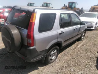 2002 Honda CR-V LX with VIN JHLRD685X2C022199, listed as a IAAI auction lot 41856270 with 169,632 mi miles and . Bid and sale history available at DreamBid. Image 4.