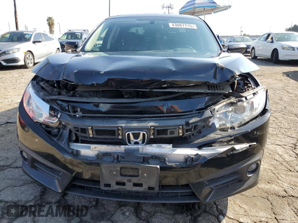 2018 Honda Civic EX-T z VIN JHMFC1F38JX018777, wystawiony jako Copart lot #43087715 z przebiegiem 143 847 mil mil oraz Szkoda całkowita • Salvage title. Historia ofert i sprzedaży dostępna na DreamBid. Obrazek 5.