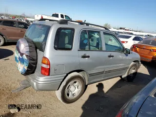 2003 Suzuki Vitara z VIN 2S3TE52V936103483, wystawiony jako Copart lot #82235884 z przebiegiem 173 354 mil mil oraz Szkody całkowita. Historia ofert i sprzedaży dostępna na DreamBid. Obrazek 3.