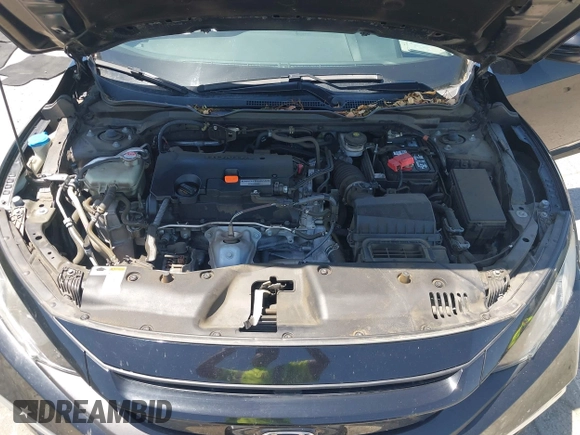 2020 Honda Civic LX with VIN 19XFC2F66LE213975, listed as a IAAI auction lot 42398098 with 69,902 mi miles and . Bid and sale history available at DreamBid. Image 10.
