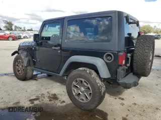 2016 Jeep Wrangler Rubicon with VIN 1C4BJWCG3GL162649, listed as a Copart auction lot 86327414 with 131,407 mi miles and Salvage title. Bid and sale history available at DreamBid. Image 2.