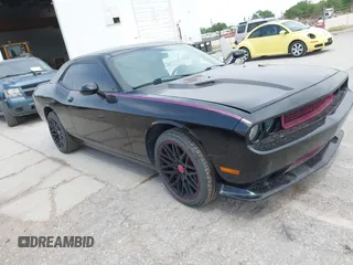 2012 Dodge Challenger SXT Plus with VIN 2C3CDYAG5CH268607, listed as a IAAI auction lot 41982122 with 188,091 mi miles. Bid and sale history available at carsss.com. Image 5.
