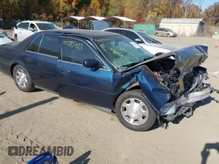 2002 Cadillac DeVille with VIN 1G6KD54Y62U183770, listed as a IAAI auction lot 40775473 with 92,510 mi miles. Bid and sale history available at carsss.com. Image 1.
