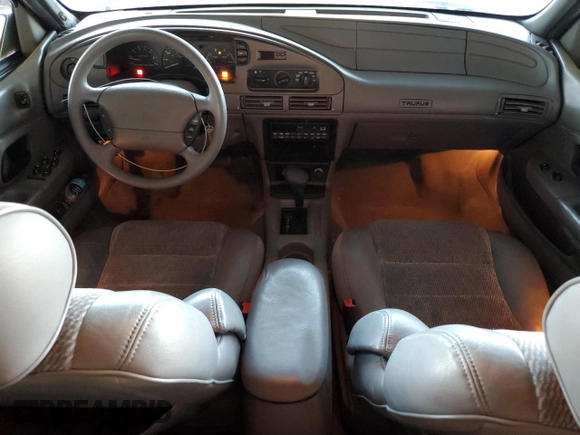 1995 Ford Taurus GL z VIN 1FALP524XSG154141, wystawiony jako Copart lot #77271544 z przebiegiem 72 118 mil mil oraz Czysty tytuł • Clean title. Historia ofert i sprzedaży dostępna na DreamBid. Obrazek 8.
