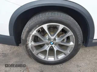 2020 BMW X5 xDrive40i with VIN 5UXCR6C01L9C65917, listed as a IAAI auction lot 41737691 with 66,657 mi miles and . Bid and sale history available at DreamBid. Image 12.