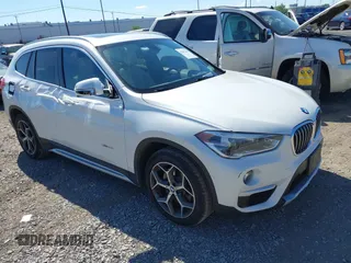 2017 BMW X1 xDrive28i with VIN WBXHT3C32H5F83287, listed as a IAAI auction lot 42791160 with 69,006 mi miles and . Bid and sale history available at DreamBid. Image 1.