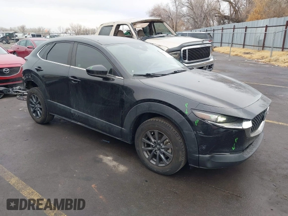2020 Mazda CX-30 with VIN 3MVDMABLXLM113036, listed as a IAAI auction lot 41173272 with 65,570 mi miles. Bid and sale history available at carsss.com. Image 1.