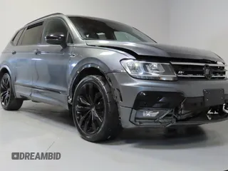 2020 Volkswagen Tiguan SE z VIN 3VV3B7AXXLM154326, wystawiony jako Copart lot #59328395 z przebiegiem 62 793 mil mil oraz Czysty tytuł • Clean title. Historia ofert i sprzedaży dostępna na DreamBid. Obrazek 1.