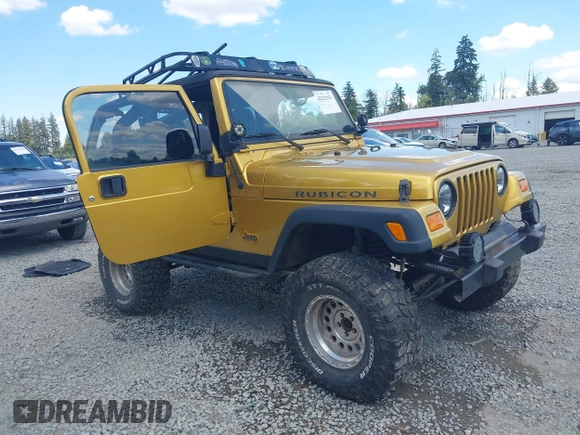 2003 Jeep Wrangler Rubicon with VIN 1J4FA69S93P302102, listed as a IAAI auction lot 42312951 with 146,408 mi miles and . Bid and sale history available at DreamBid. Image 1.