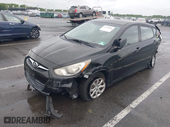 2012 Hyundai Accent GS with VIN KMHCT5AE4CU022894, listed as a IAAI auction lot 42318881 with 179,819 mi miles and . Bid and sale history available at DreamBid. Image 2.