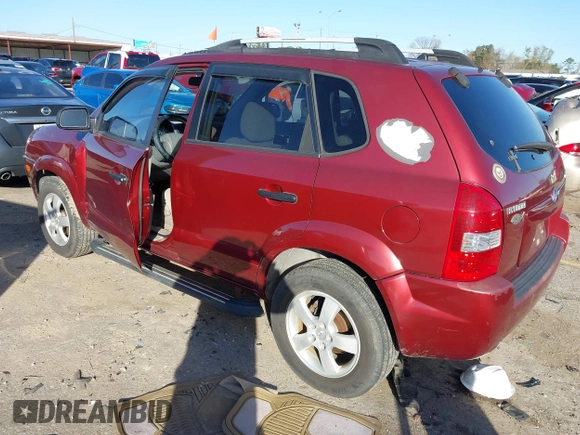 2005 Hyundai Tucson GL with VIN KM8JM12B75U108866, listed as a IAAI auction lot 41218960 with 111,319 mi miles. Bid and sale history available at carsss.com. Image 3.