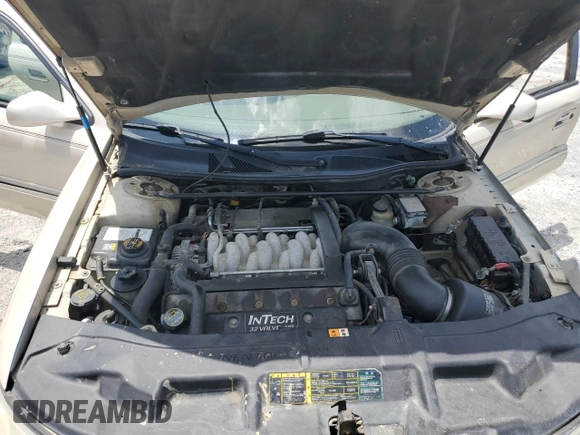 2001 Lincoln Continental z VIN 1LNHM97V91Y622267, wystawiony jako Copart lot #59915445 z przebiegiem 77 070 mil mil oraz Szkoda całkowita • Salvage title. Historia ofert i sprzedaży dostępna na DreamBid. Obrazek 11.