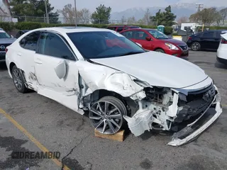 2017 Lexus ES 300h with VIN JTHBW1GG2H2143014, listed as a IAAI auction lot 41469201 with 153,631 mi miles and . Bid and sale history available at DreamBid. Image 1.