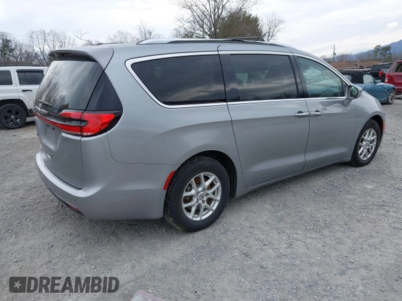 2021 Chrysler Pacifica Touring L with VIN 2C4RC1BG3MR542543, listed as a IAAI auction lot 41657073 with 118,833 mi miles and . Bid and sale history available at DreamBid. Image 4.