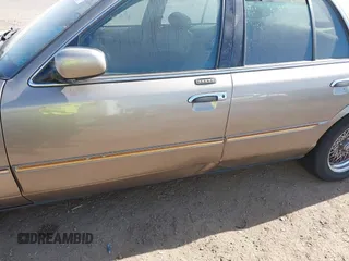 2002 Mercury Grand Marquis LS Premium z VIN 2MEFM75W32X636872, wystawiony jako IAAI lot #41717410 z przebiegiem 88 840 mil mil oraz . Historia ofert i sprzedaży dostępna na DreamBid. Obrazek 6.