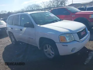 2005 GMC Envoy SLE with VIN 1GKDS13S852141073, listed as a IAAI auction lot 41600869 with Not provided miles and . Bid and sale history available at DreamBid. Image 1.