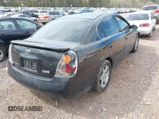 2003 Nissan Altima S with VIN 1N4AL11D03C165042, listed as a IAAI auction lot 41888473 with 306,629 mi miles. Bid and sale history available at carsss.com. Image 4.