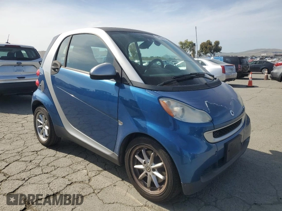 2009 Smart fortwo Pure with VIN WMEEJ31XX9K235766, listed as a Copart auction lot 54985845 with 75,708 mi miles and Clean Title. Bid and sale history available at carsss.com. Image 4.