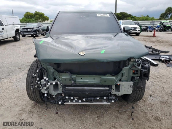 2023 Rivian R1T Adventure with VIN 7FCTGAAA8PN001040, listed as a Copart auction lot 71517874 with 19,789 mi miles and Salvage Title. Bid and sale history available at carsss.com. Image 5.