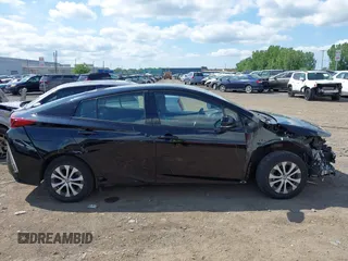 2020 Toyota Prius LE with VIN JTDKARFP3L3156910, listed as a IAAI auction lot 42467826 with 103,285 mi miles and . Bid and sale history available at DreamBid. Image 13.
