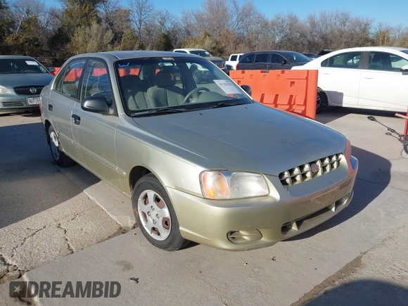2000 Hyundai Accent z VIN KMHCG45G3YU034438, wystawiony jako IAAI lot #41356583 z przebiegiem 57 283 mil mil oraz . Historia ofert i sprzedaży dostępna na DreamBid. Obrazek 1.