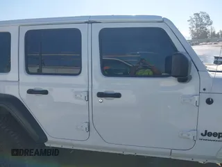 2023 Jeep Wrangler Willys with VIN 1C4HJXDG0PW638871, listed as a IAAI auction lot 42700599 with 16,171 mi miles and . Bid and sale history available at DreamBid. Image 13.
