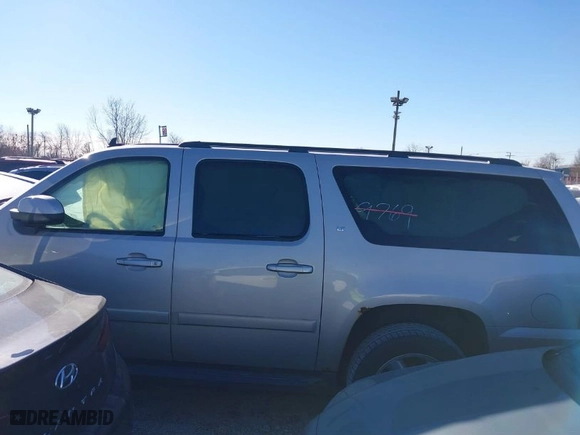 2007 Chevrolet Suburban LT with VIN 1GNFK16327J351287, listed as a IAAI auction lot 38288423 with 152,511 mi miles. Bid and sale history available at carsss.com. Image 14.